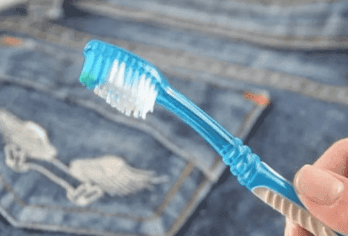 toothbrush and jeans