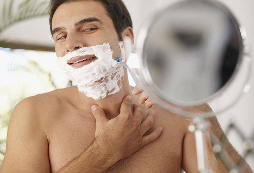 man shaves